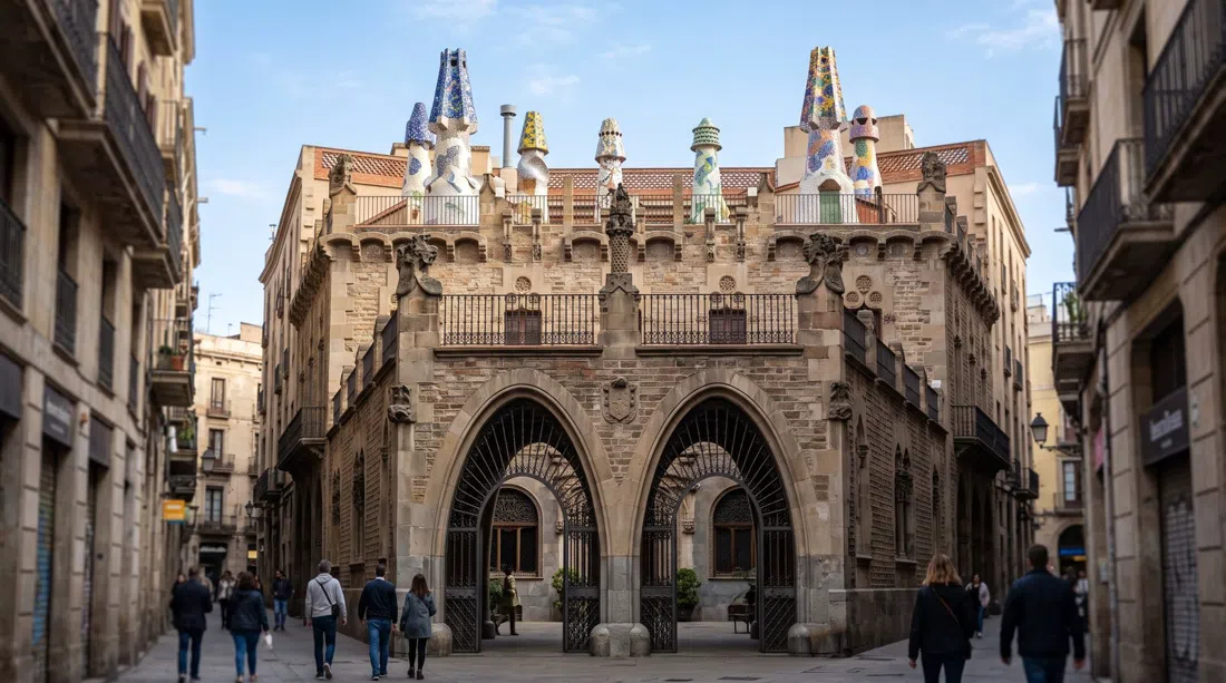 Palau Güell on Nou de la Rambla, its parabolic-arch entrance and mosaic chimney roof terrace seen in clear daylight